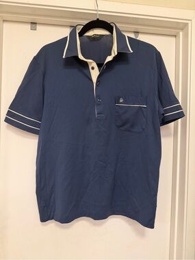 St Michael men’s polo shirt. Blue with white contrast stripe - size L